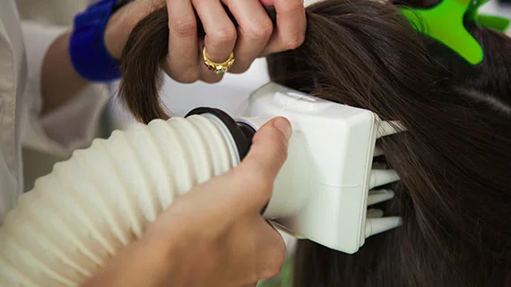 Close up view of the heated air device for dehydrating head lice
